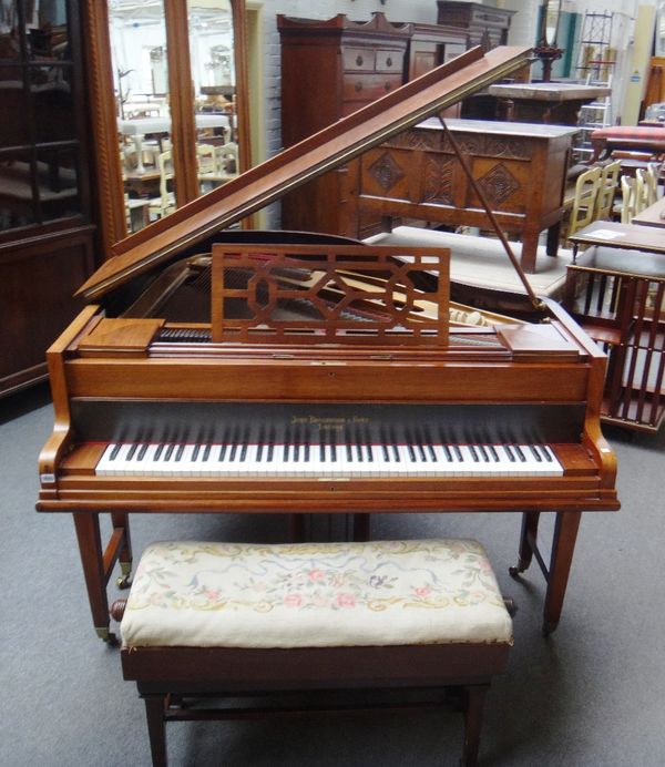 A mahogany iron framed over-strung piano by John Broadwood & Sons, London, stamped 50827, 168cm long x 149cm wide.