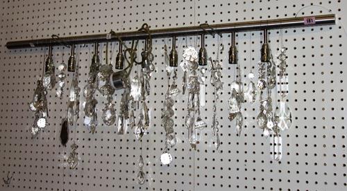 A 20th century chrome and glass nine light light fitting.