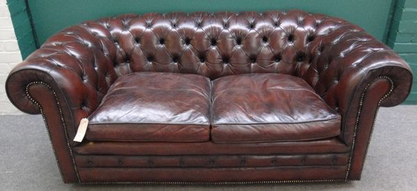 A 20th century brown leather button upholstered Chesterfield sofa, 181cm wide.