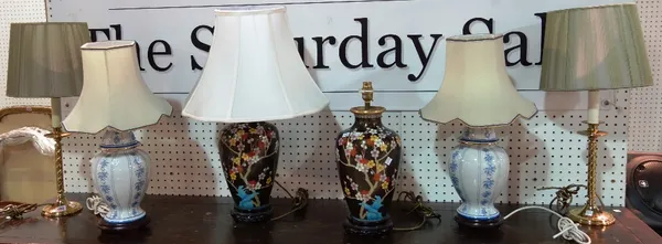 A pair of blue and white floral ceramic table lamps, a pair of cloisonné table lamps and two brass lamps. (6)