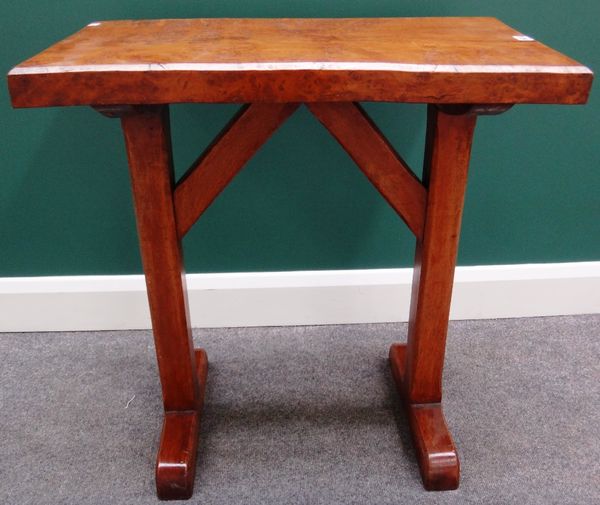 A Gothic Revival oak refectory table, the chamfered rectangular top on a pair of trestle supports, 71cm wide.