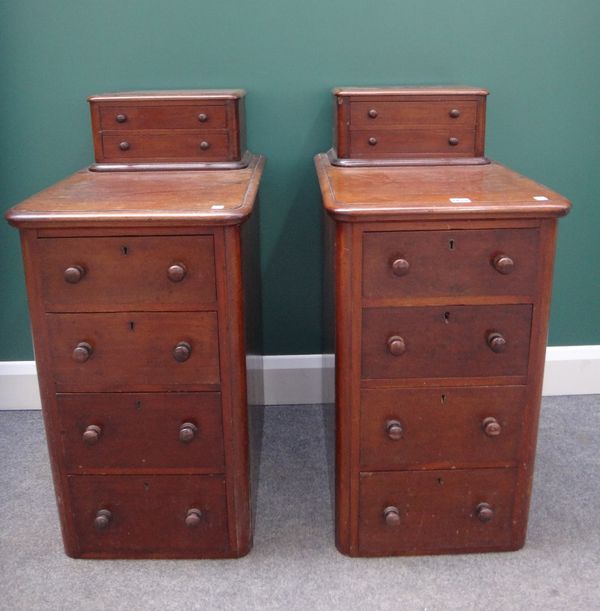 A pair of 19th century mahogany pedestals, each with two short drawers over four further drawers, 43cm wide.