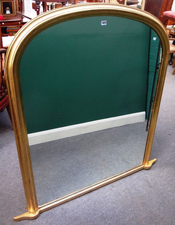 A Victorian style gilt framed arch top overmantel mirror, 137cm wide x 137cm high.