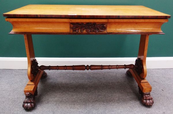 An early Victorian rosewood banded Bird's Eye maple rectangular centre table, with pair of cushion frieze drawers on trestle end standards united by t