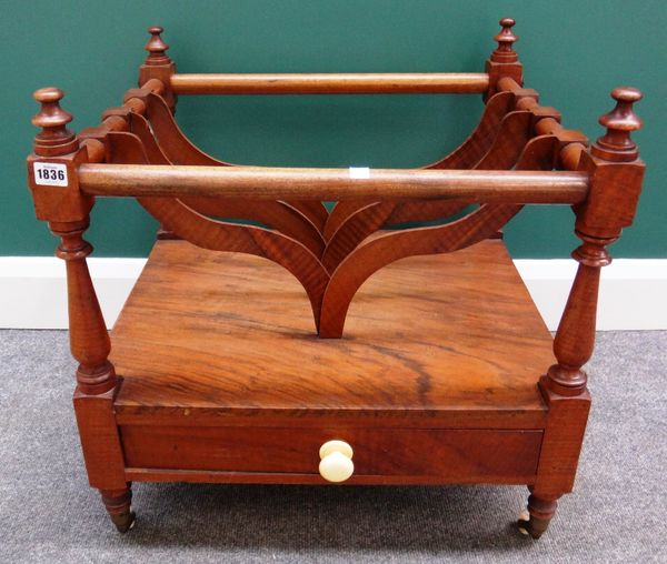 A 19th century walnut Canterbury, with four divisions over single drawer on turned supports, 60cm wide.