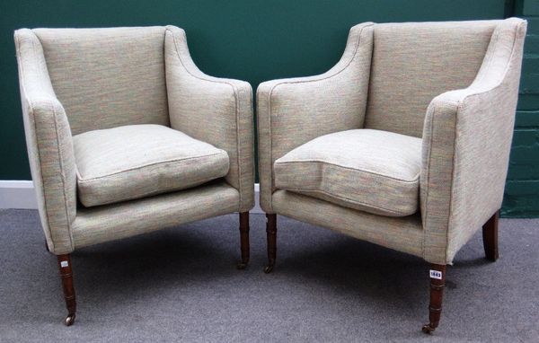 A pair of Regency style square tub back armchairs on ring turned supports.