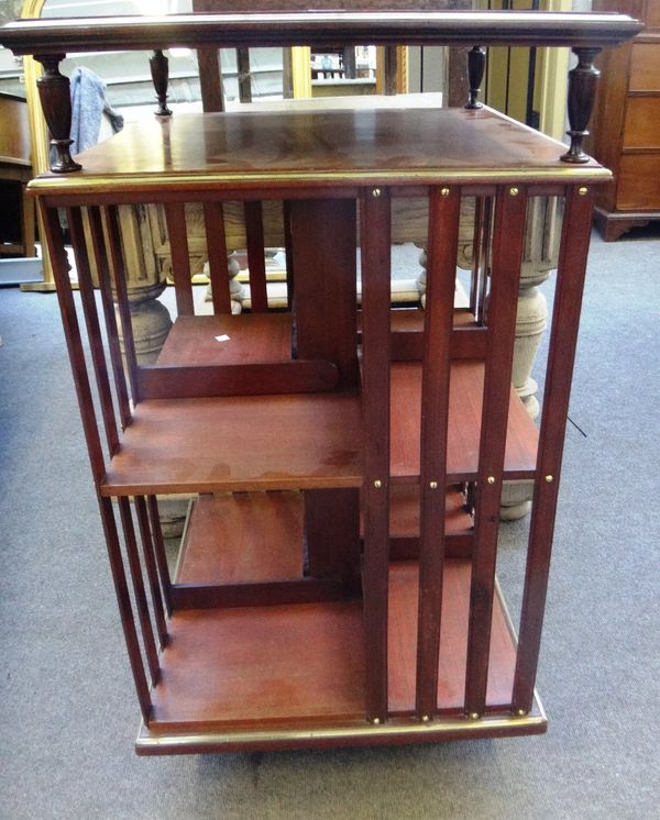 A 19th century French gilt metal mounted mahogany square revolving bookcase, with rectangular plaque, Bibliotheque Terouem 19 Rue Scribe, Paris, 54cm