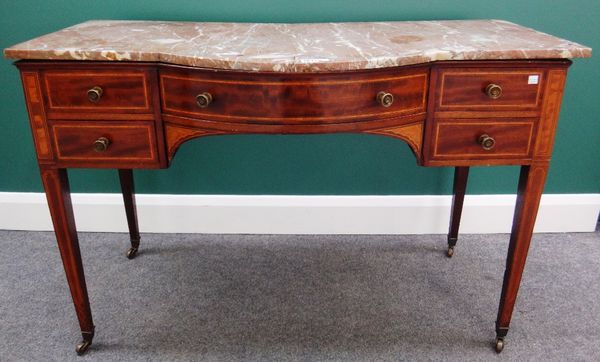 A Gillows washstand, the bow marble top over an inlaid mahogany base, with five drawers about the knee, on tapering square supports (a.f), 110cm wide.