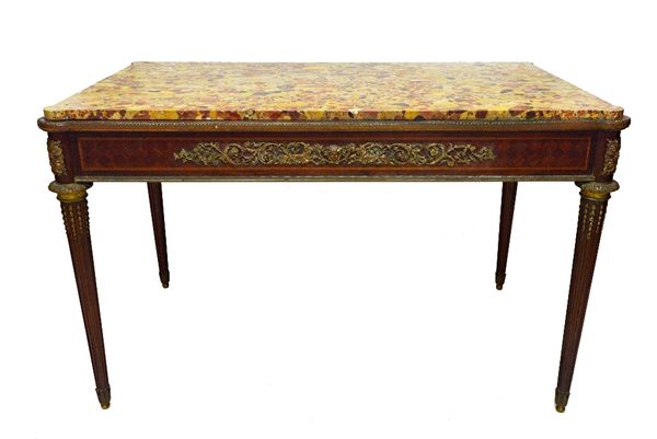 An 18th century style French centre table, the rectangular marble top with outstepped rounded corners over a gilt metal mounted fruitwood parquetry in