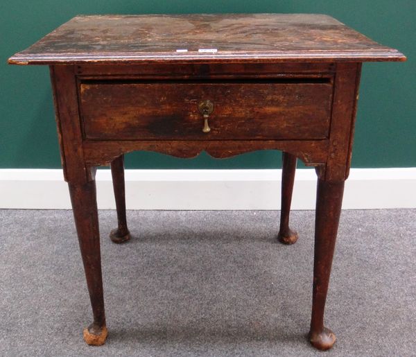 A mid-18th century pine lowboy, with single frieze drawer, on club supports, 68cm wide.