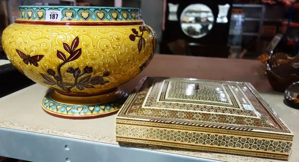 An inlaid Indian style lidded box and a large pottery jardiniere. (2)