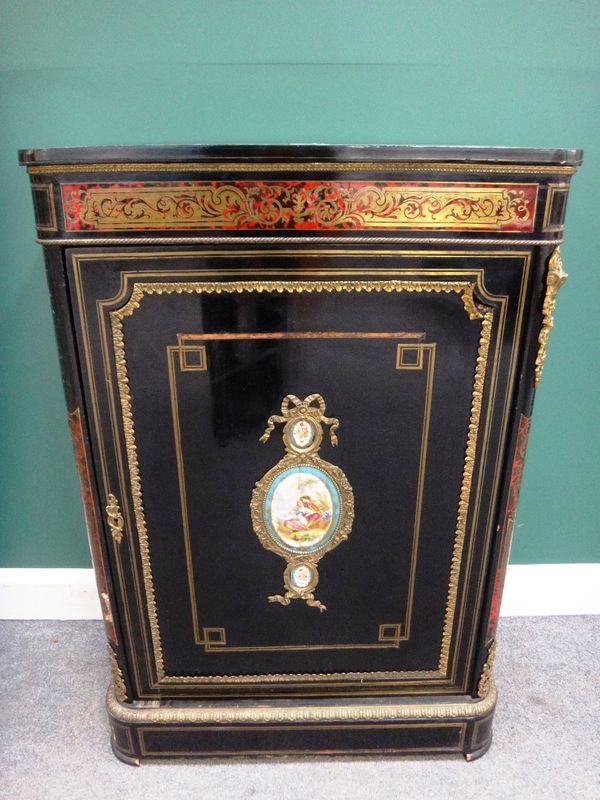 A Victorian ebonised gilt metal mounted Boulle work side cabinet, the single door with Sevres style mounts, on plinth base, 74cm wide.