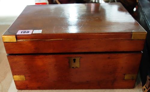 A walnut and brass bound writing slope.