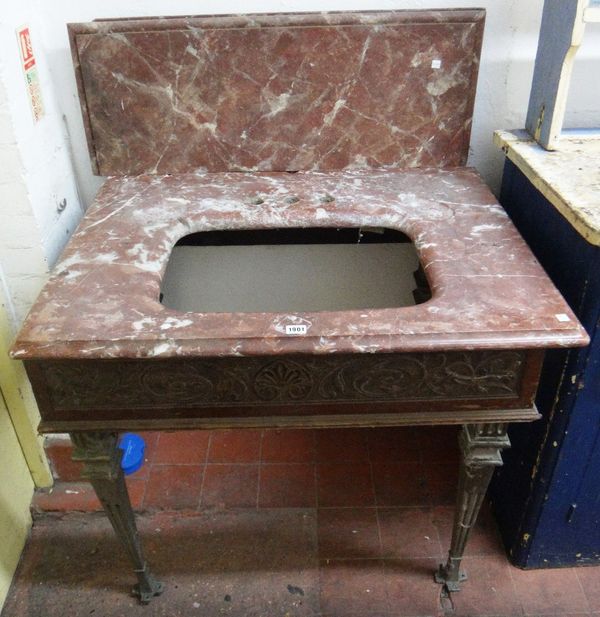 An early 20th century sink unit, with rouge marble splash back and surround, inset with a ceramic sink, by Doulton & Co Limited, raised on a grey pain