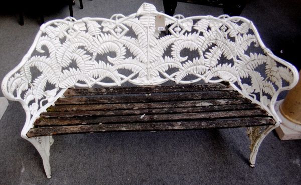 A 20th century Coalbrookdale style white painted garden bench, in the fern and berry pattern, 153cm wide.