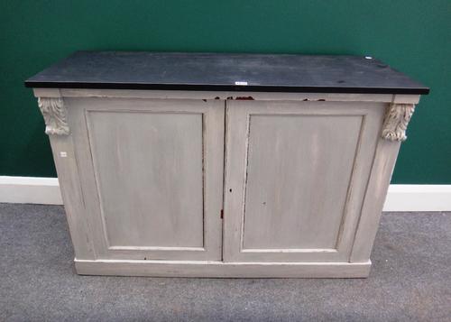 A 19th century later grey painted side cabinet, with rectangular slate top over a pair of panelled doors, and plinth base, 42cm wide.