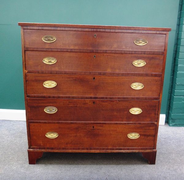 A George III mahogany chest of five long graduation drawers, on bracket feet.