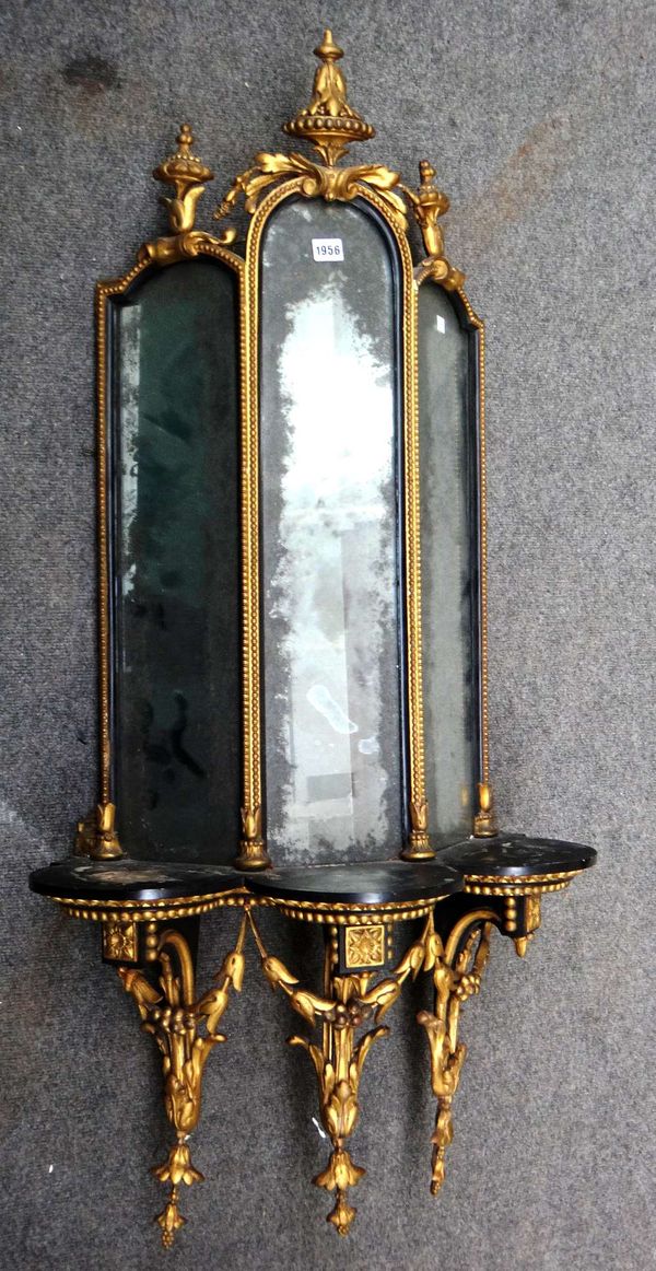 A 19th century ebonised parcel gilt triple plate convex wall mirror with fruiting swag decoration, 50cm wide x 125cm high.