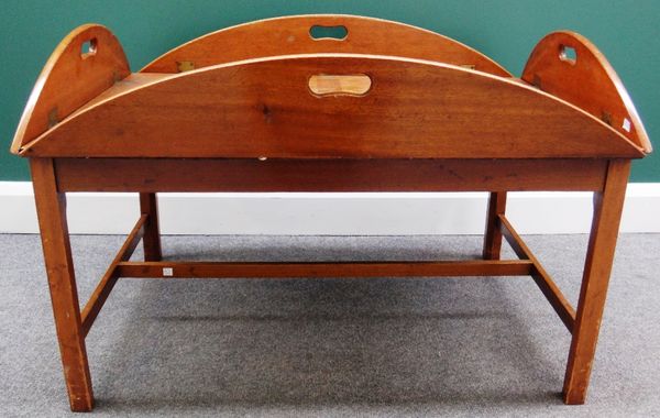 An 18th century style mahogany drop flap butler's tray with pierced sides on stand, 91cm wide.