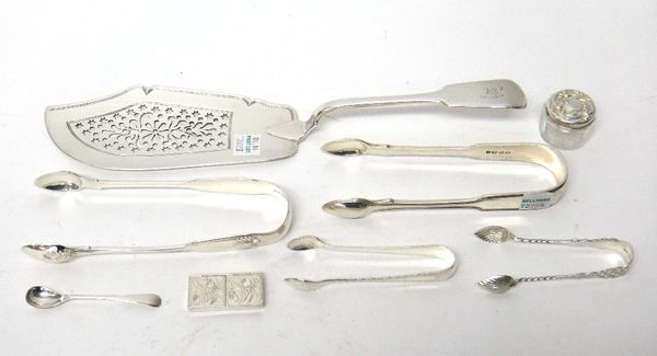 Silver, comprising; a fiddle pattern fish slice, London 1836, a pair of fiddle, thread and shell pattern sugar tongs, London 1869, three further pairs