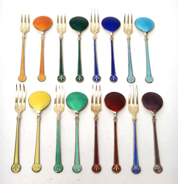 Eight Norwegian silver gilt and vari coloured enamel pastry forks and eight Norwegian silver gilt and vari coloured enamel spoons, detailed David Ande