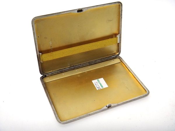 A silver rectangular cigarette case, gilt within, the exterior with banded decoration, retailed by Aspreys, London 1957, gross weight 200 gms.