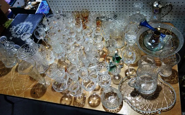 A large quantity of cut glass, including a claret jug, decanters, vases, bowls and sundry.  (qty)