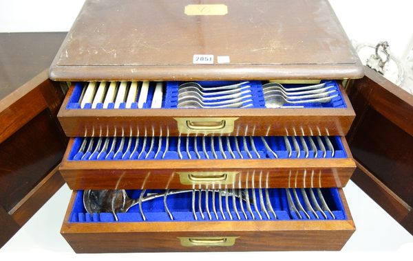 A silver plated canteen of flatware in the Old English pattern, fitted in a mahogany two door campaign chest.