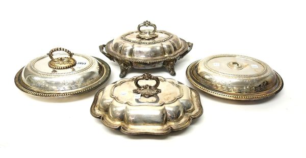 A group of four silver plated entree dishes. (4)