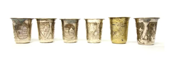 Five Russian Vodka tots, having two varieties of engraved decoration, 1896 and a Russian gilt Vodka tot, with engraved decoration 1894.