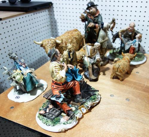 A quantity of ceramics of mainly figures including Capo Di Monte, Continental models of cows, oriental figures and sundry. (qty)