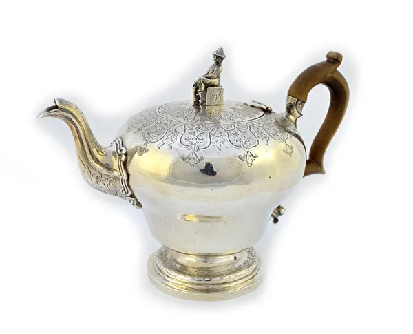 A William IV silver teapot, of inverted pear shaped form, decorated with bold engraved borders, the hinged lid with a seated Chinaman finial and on a