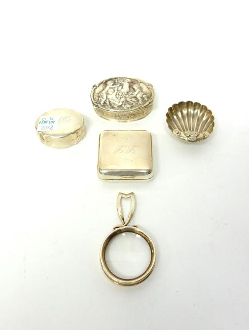 A German oval hinge lidded box, the cover decorated with cherubs within a scrolling surround, detailed 800, two further boxes, detailed 800, a salt fo