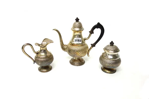 An Italian three piece coffee set, comprising; a coffee pot, a sugar bowl, with a detachable cover and a milk jug, each piece with cross hatched decor
