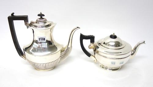 Plated wares, comprising; a coffee pot, of oval form, with partly fluted decoration, a teapot, a twin handled punch bowl, eight punch cups, each havin