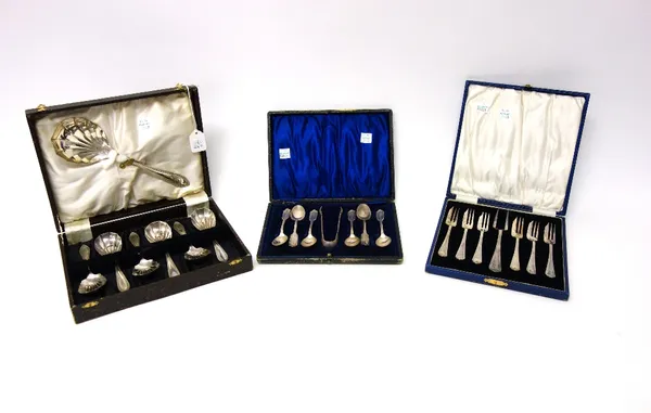 Silver, comprising; six coffee spoons, Birmingham 1939 and a similar pair of claw ended sugar tongs, Birmingham 1938, with a case, a late Victorian su