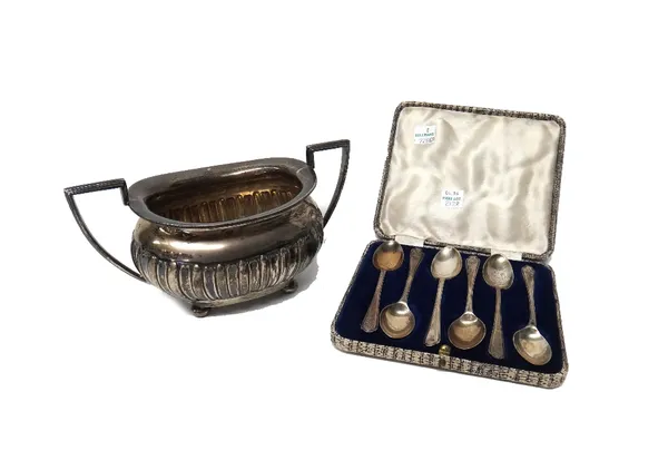 Silver, comprising; a twin handled sugar bowl, with partly fluted decoration, raised on four bun feet, Sheffield 1943 and six silver teaspoons, the ha
