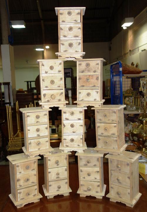 A group of ten 20th century three drawer table top chests. (10)