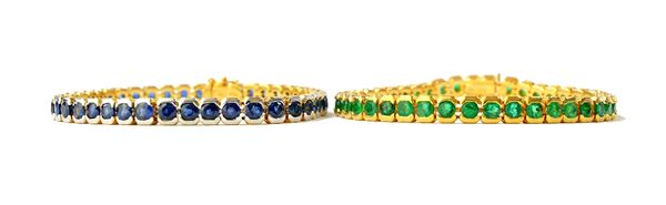 A gold and emerald set line bracelet, mounted with a row of circular cut emeralds, on a snap clasp, detailed 750 18 K, length 17.3cm and a gold and sa