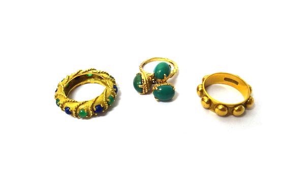 A gold, lapis lazuli and stained green agate set eternity ring, with ropetwist decoration, maker B M Co, ring size K and a half, gross weight 8.2 gms,