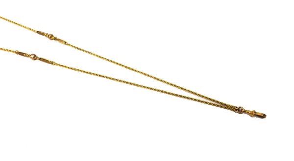 A gold ropetwist link long chain, with twin bar and faceted bead divisions at intervals, detailed 9 C, the front fitted with a gold swivel, length 146