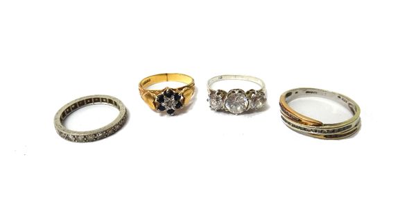 A diamond set full eternity ring, mounted with circular cut diamonds, a 9ct gold, sapphire and diamond set cluster ring, a 9ct vary coloured gold and