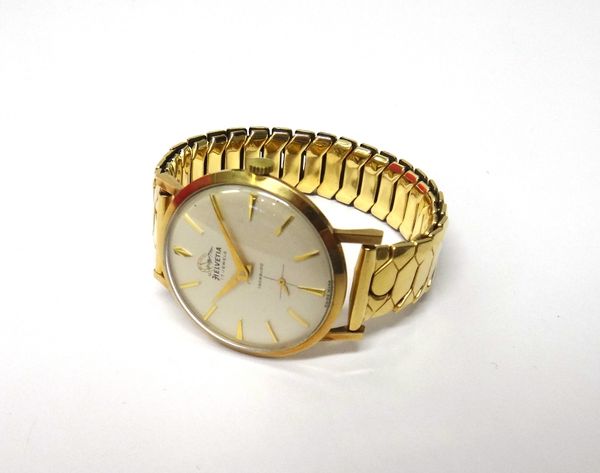 A gentleman's 9ct gold circular cased Helvetia wristwatch, the signed circular silvered dial with gilt baton shaped numerals, tapering gilt hands and