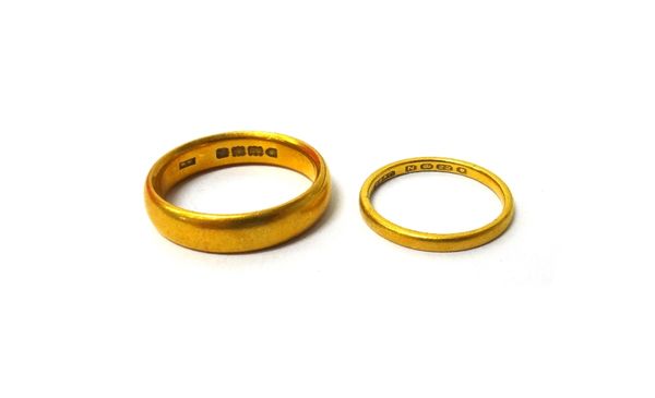 A 22ct gold wide band wedding ring, London possibly 1910, ring size R and a half and another 22ct gold wedding ring, London 1948, ring size L and a ha