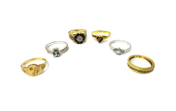 A 9ct gold, sapphire and diamond set nine stone cluster ring, an 18ct white gold ring, claw set with an oval cut pale green gemstone between diamond s