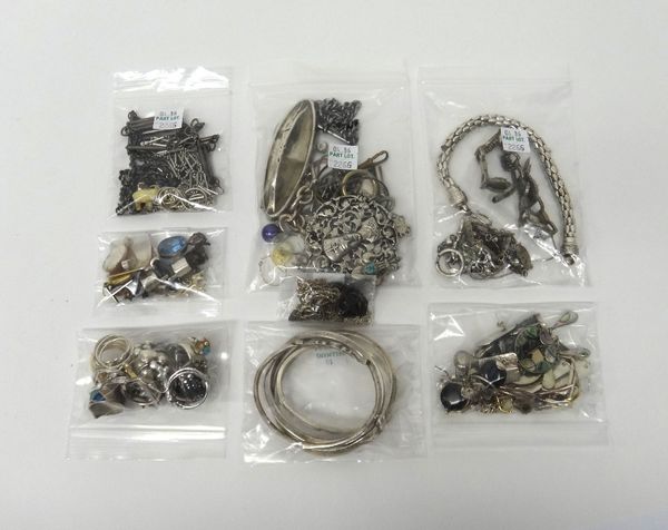 Silver and other jewellery, comprising; twenty rings, eighteen pairs of earrings and drops, a dress Albertine, a garnet set bracelet, four further bra