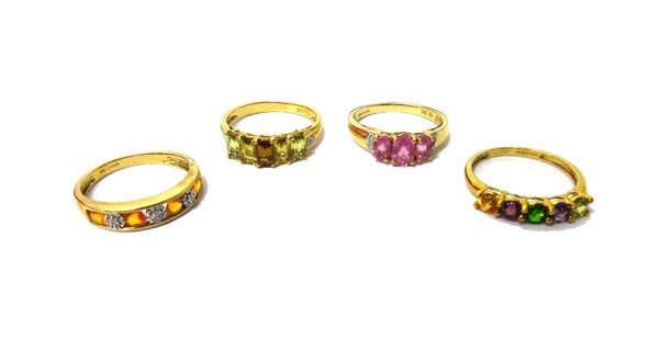 A 9ct gold, diamond and orange gemstone set half hoop ring and three further 9ct gold and coloured gemstone set rings, in a variety of designs.