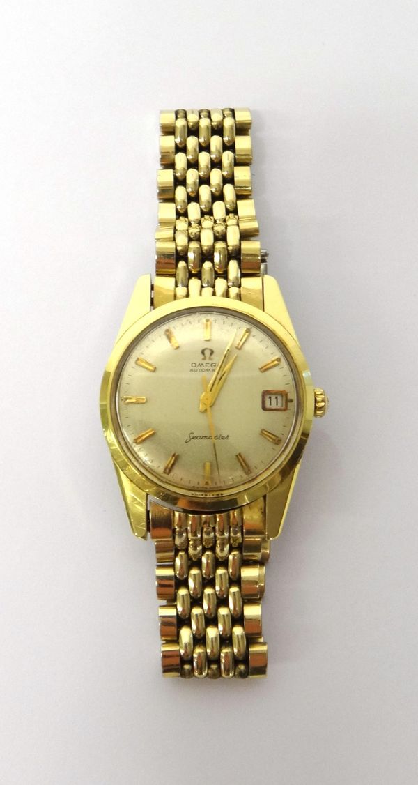 A gentleman's gilt metal fronted and steel Omega Seamaster Automatic wristwatch, the signed circular silvered dial, with gilt baton shaped numerals, c