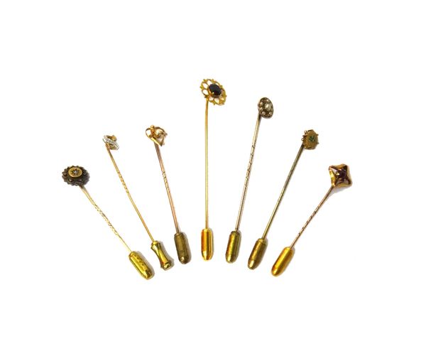 A gold topped and rose diamond set stick pin, detailed 15 CT, a gold topped and seed pearl set stick pin, detailed 9 CT, a 9ct gold and diamond set st