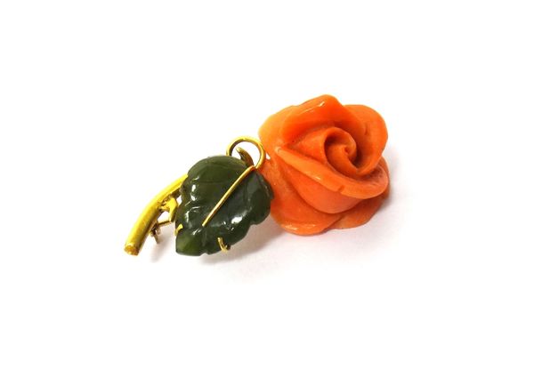 A gold, carved coral and carved nephrite brooch, designed as a flower spray, detailed 750, with a case.